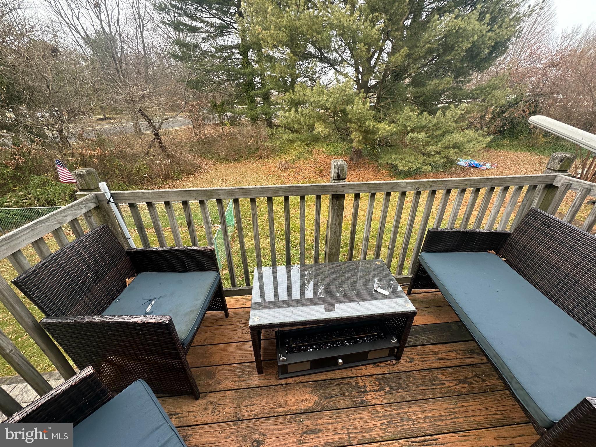 104 Willow Turn, Unit B Mount Laurel, NJ 08054 - Photo 3 of 10 a balcony with wooden floor and outdoor space
