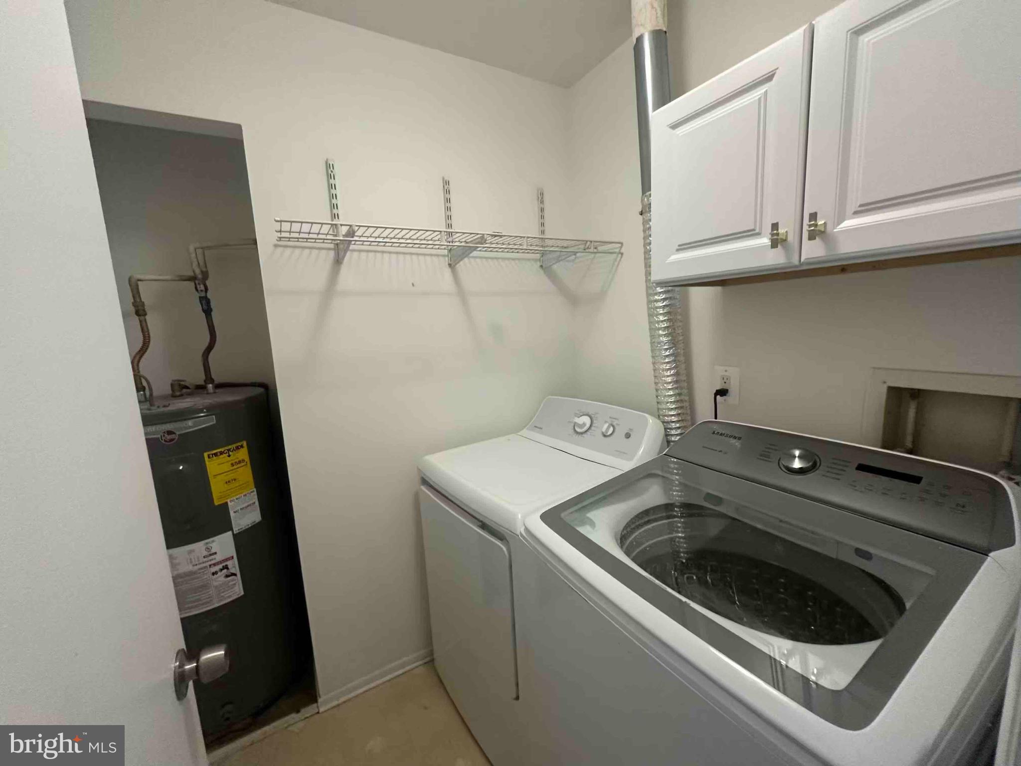 104 Willow Turn, Unit B Mount Laurel, NJ 08054 - Photo 6 of 10 a utility room with dryer and washer
