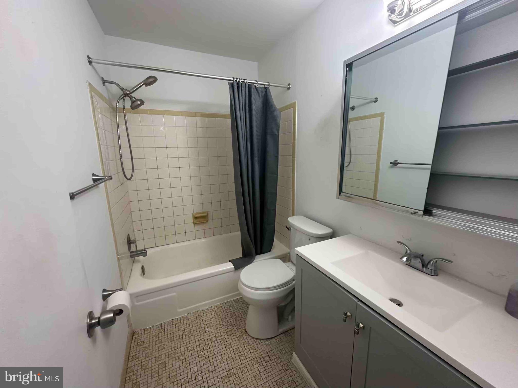 104 Willow Turn, Unit B Mount Laurel, NJ 08054 - Photo 7 of 10 a bathroom with a sink toilet and shower