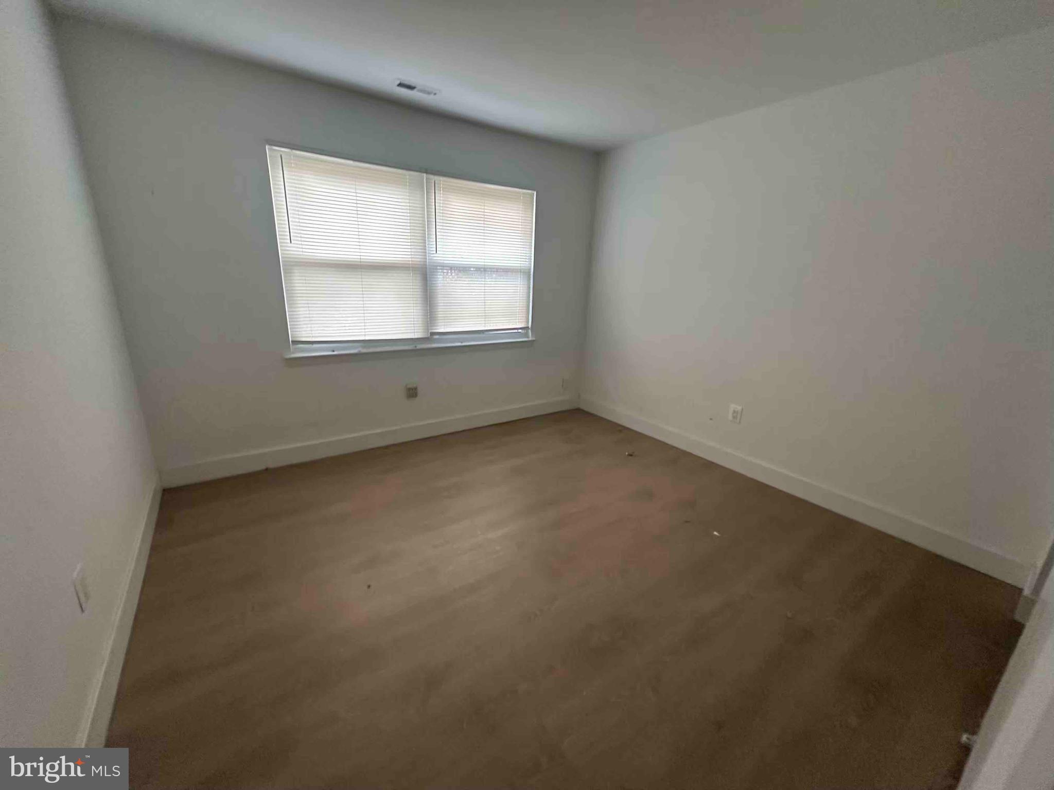 104 Willow Turn, Unit B Mount Laurel, NJ 08054 - Photo 8 of 10 an empty room with a window