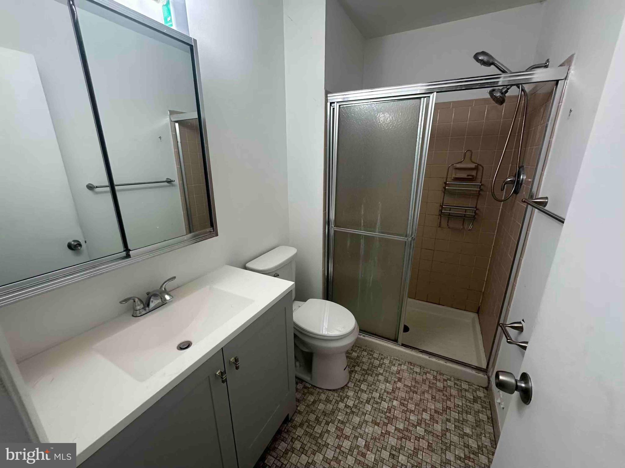 104 Willow Turn, Unit B Mount Laurel, NJ 08054 - Photo 9 of 10 a bathroom with a sink toilet and shower