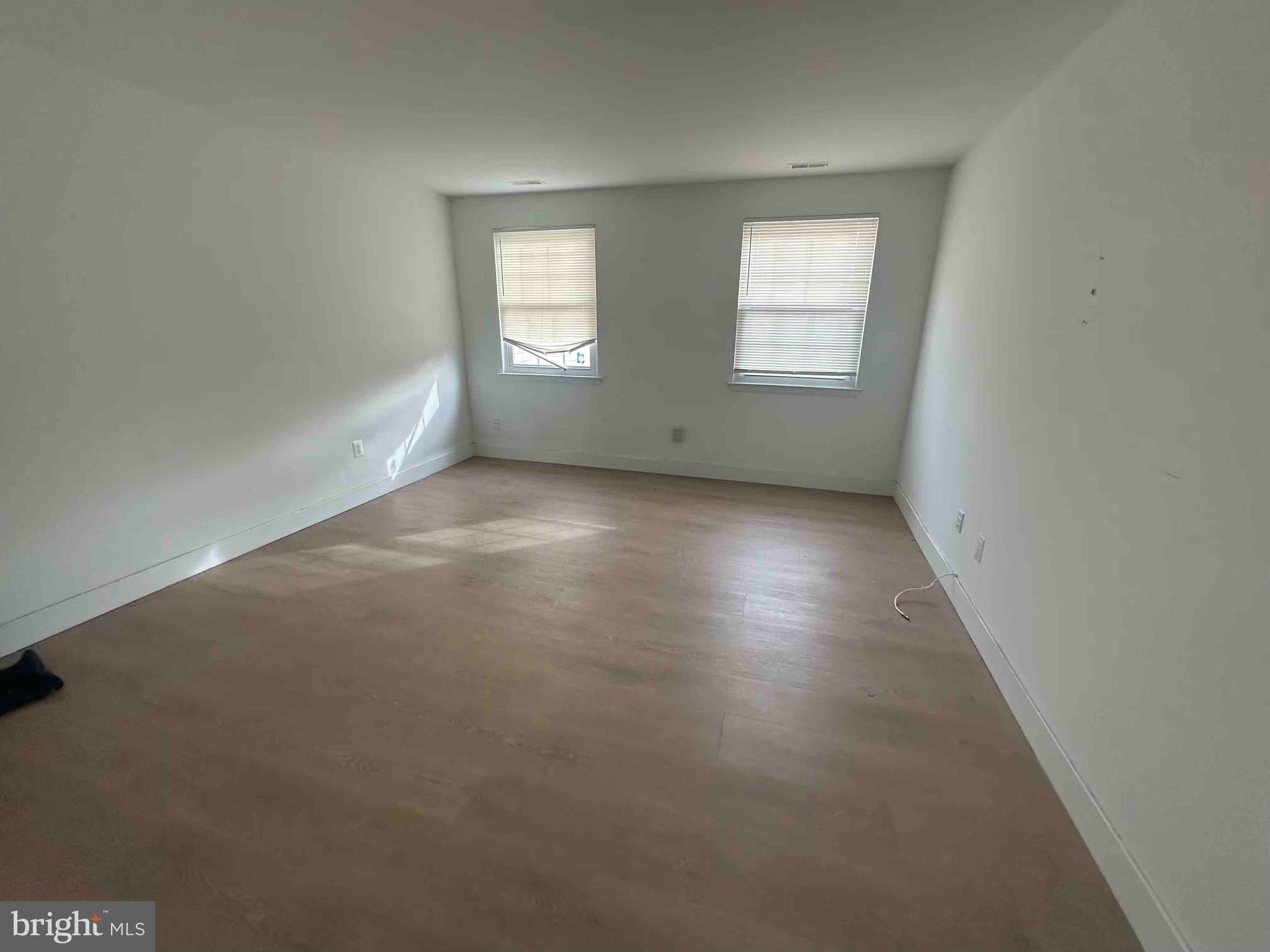 104 Willow Turn, Unit B Mount Laurel, NJ 08054 - Photo 10 of 10 an empty room with windows