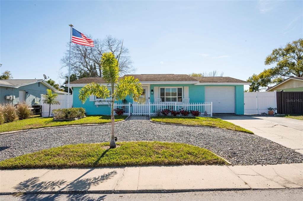 7804 Fox Hollow Drive Port Richey, FL 34668 - Photo 1 of 31 a view of outdoor space yard and swimming pool