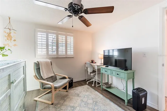 a work room with furniture and windows