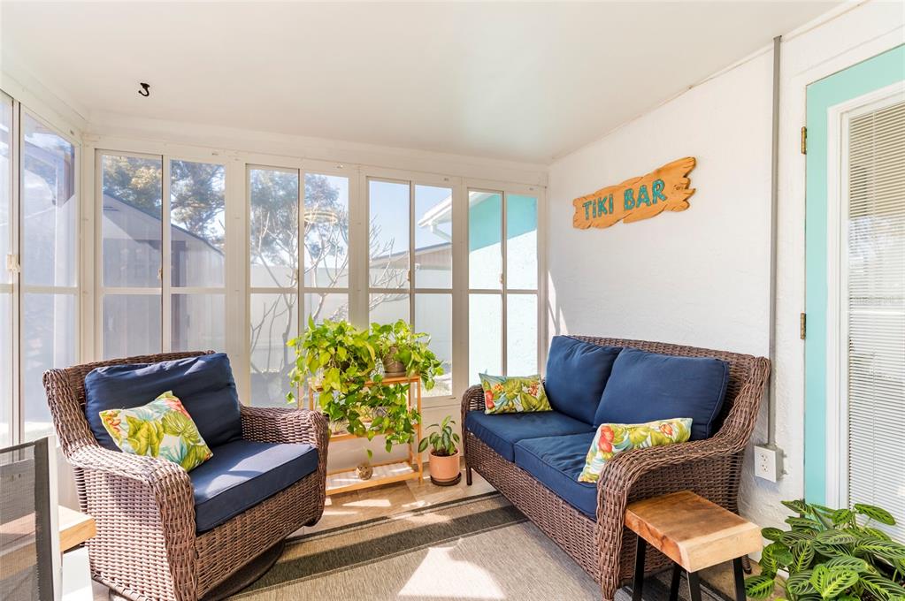 7804 Fox Hollow Drive Port Richey, FL 34668 - Photo 21 of 31 a living room with furniture and a large window