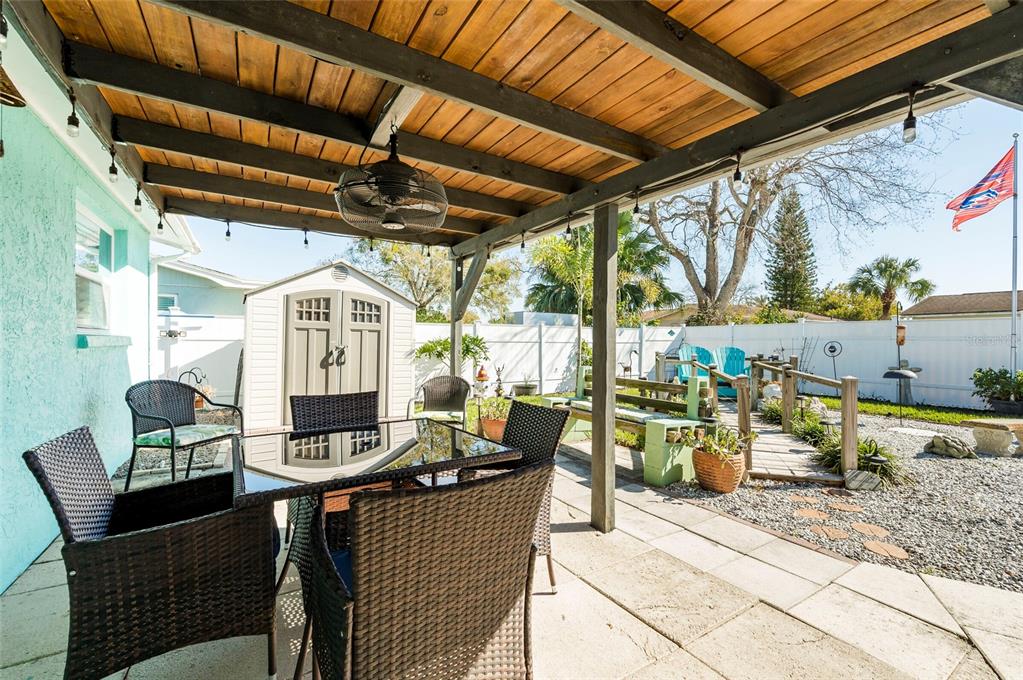 7804 Fox Hollow Drive Port Richey, FL 34668 - Photo 23 of 31 a dining room with furniture and a table