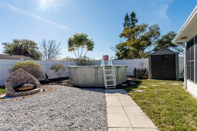 a view of a yard with an outdoor space