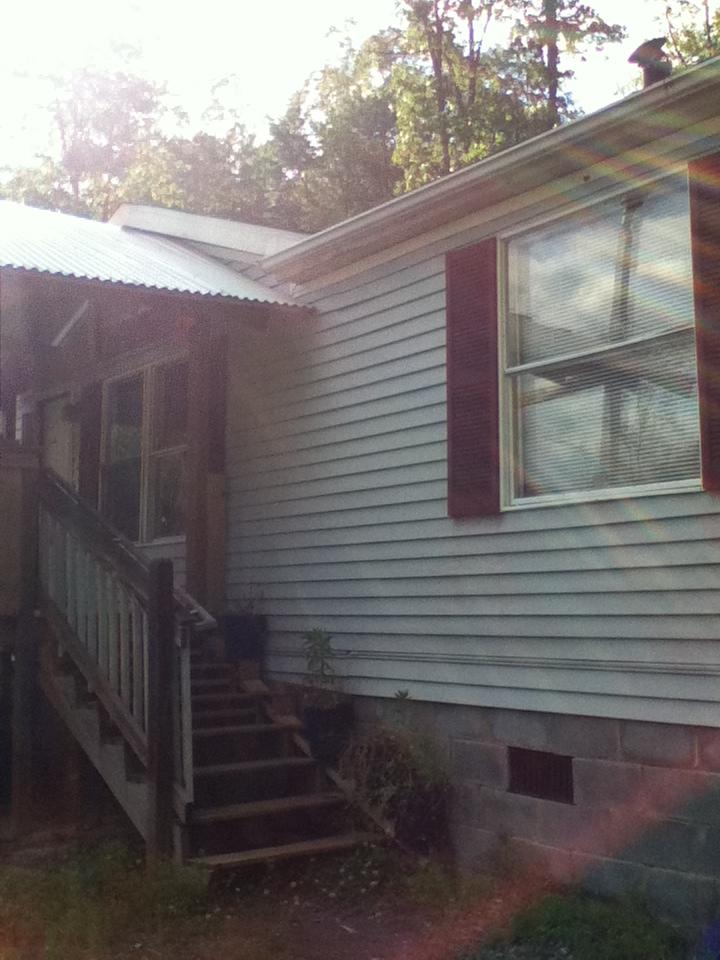 1560 Isolane Road Callaway, VA 24067 - Photo 3 of 22 a view of a house with a yard