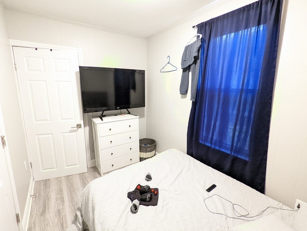 143 London Street, Unit 2 Boston, MA 02128 - Photo 3 of 9 a view of a livingroom with furniture