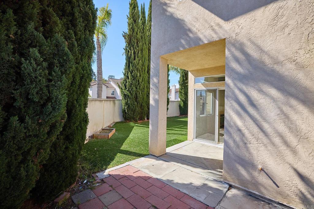 297 Diamante Way Oceanside, CA 92056 - Photo 16 of 28 a view of a house with a yard