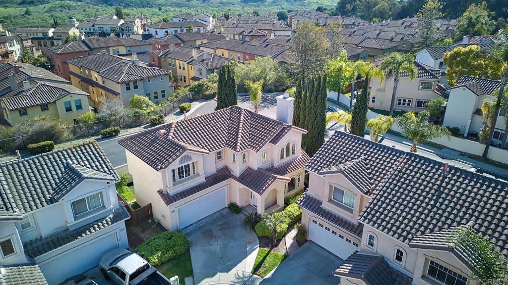 297 Diamante Way Oceanside, CA 92056 - Photo 22 of 28 an aerial view of a house with a garden