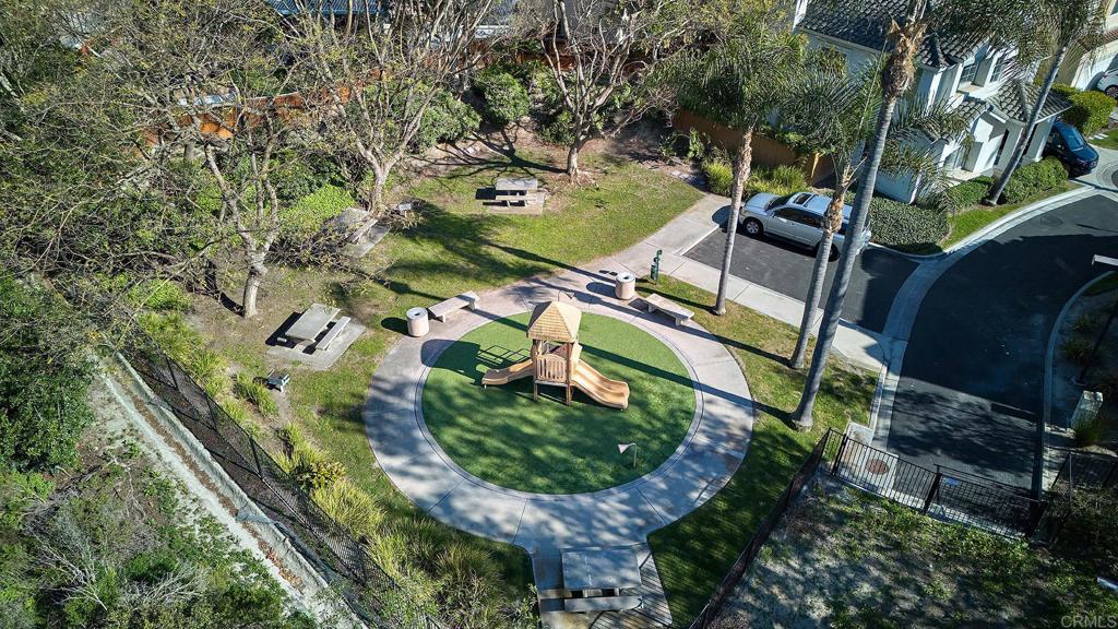 297 Diamante Way Oceanside, CA 92056 - Photo 26 of 28 an aerial view of a house with a yard