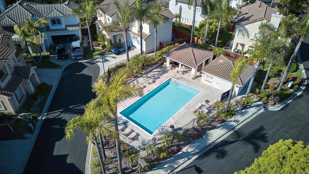 297 Diamante Way Oceanside, CA 92056 - Photo 27 of 28 an aerial view of a house with a yard and lake view