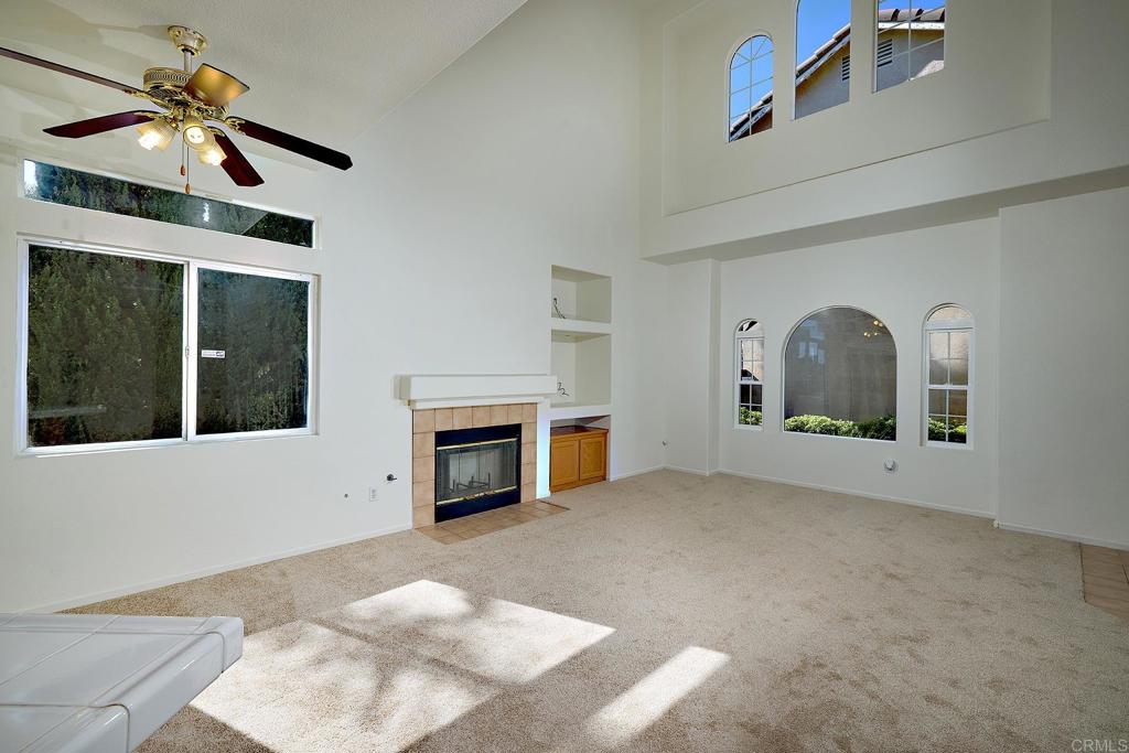 297 Diamante Way Oceanside, CA 92056 - Photo 4 of 28 a view of livingroom with a fireplace