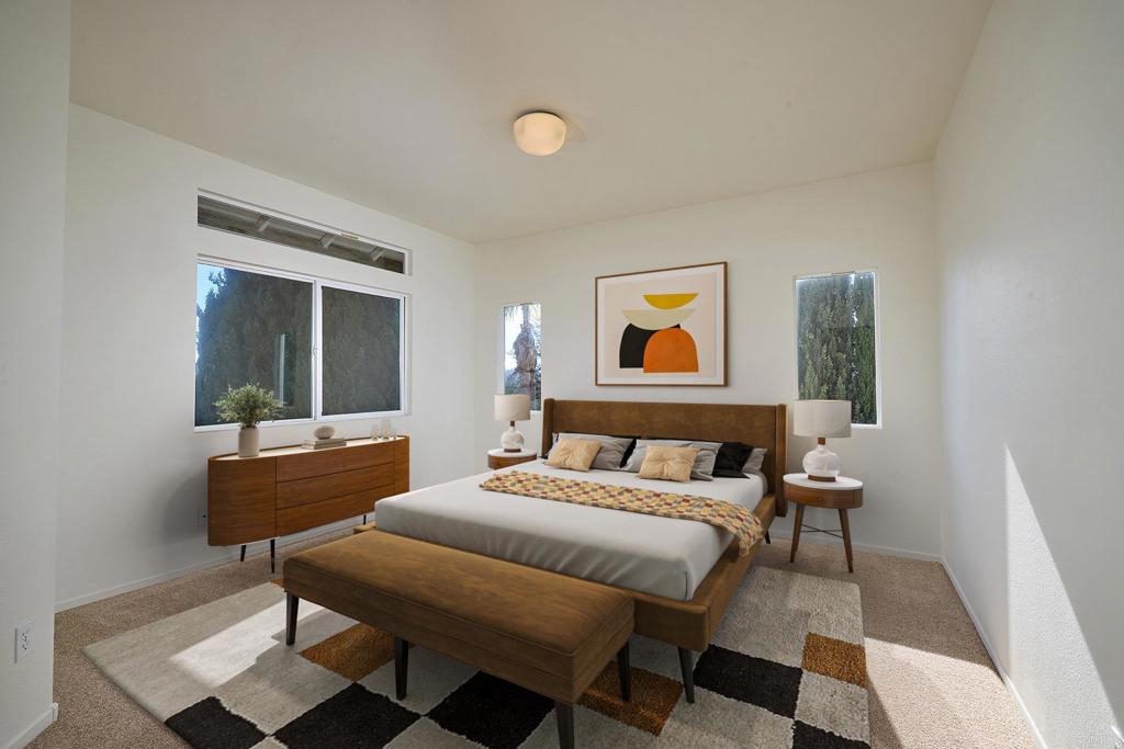 297 Diamante Way Oceanside, CA 92056 - Photo 10 of 28 a bedroom with a bed and a chandelier