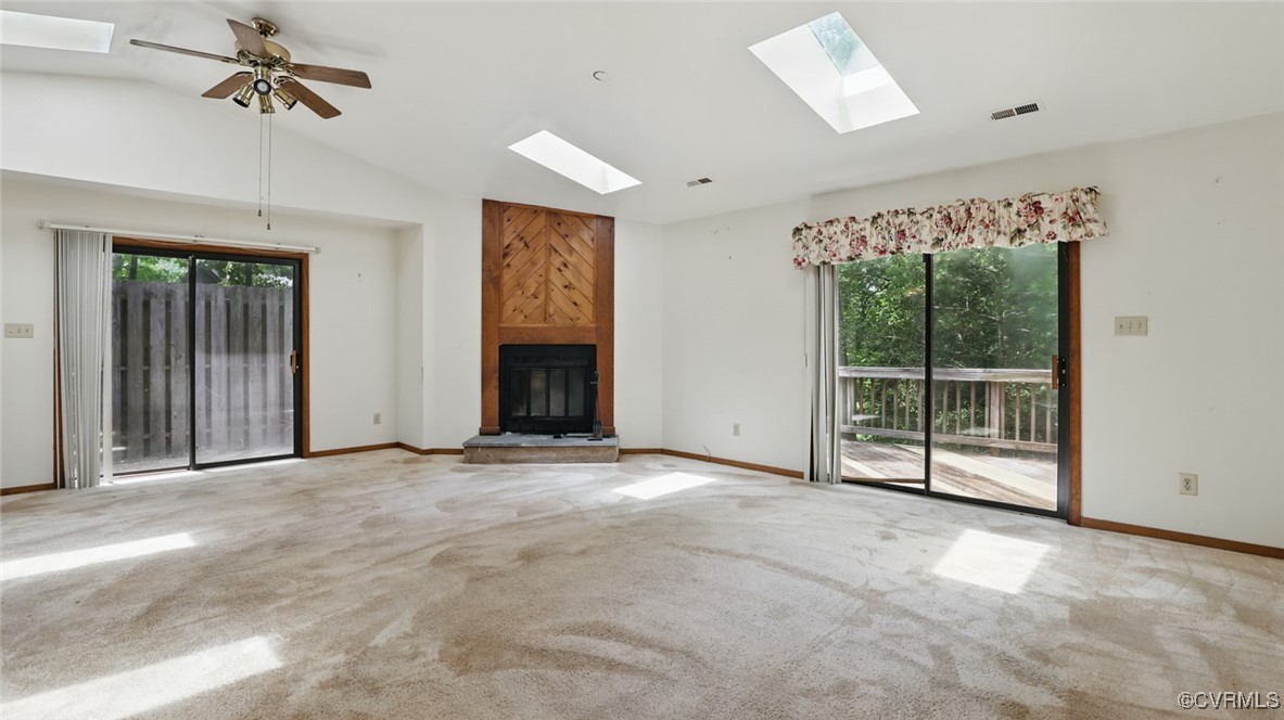 4804 Hackney Road Chesterfield, VA 23832 - Photo 47 of 50 Unfurnished living room with a skylight, a large f