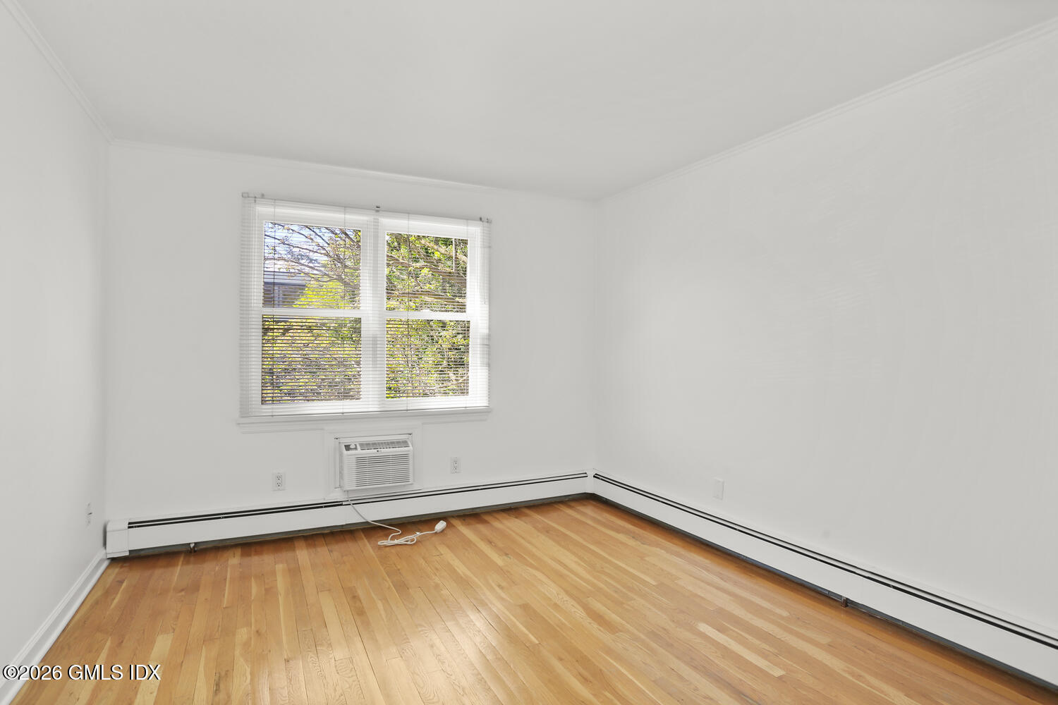 22 Grigg Street, Unit 2 Greenwich, CT 06830 - Photo 10 of 11 an empty room with a window