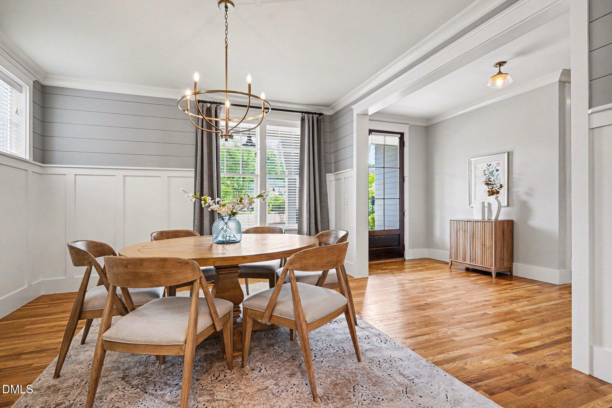824 Watercolor Way Durham, NC 27713 - Photo 6 of 28 a view of a dining room with furniture window and wooden floor