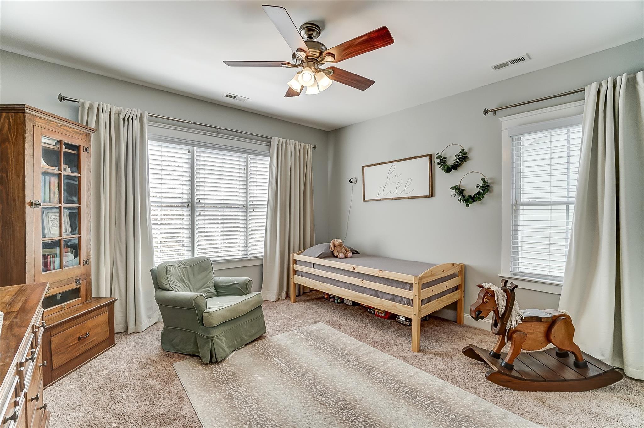 3400 Richard's Crossing Fort Mill, SC 29708 - Photo 32 of 48 a living room with furniture a ceiling fan and a window