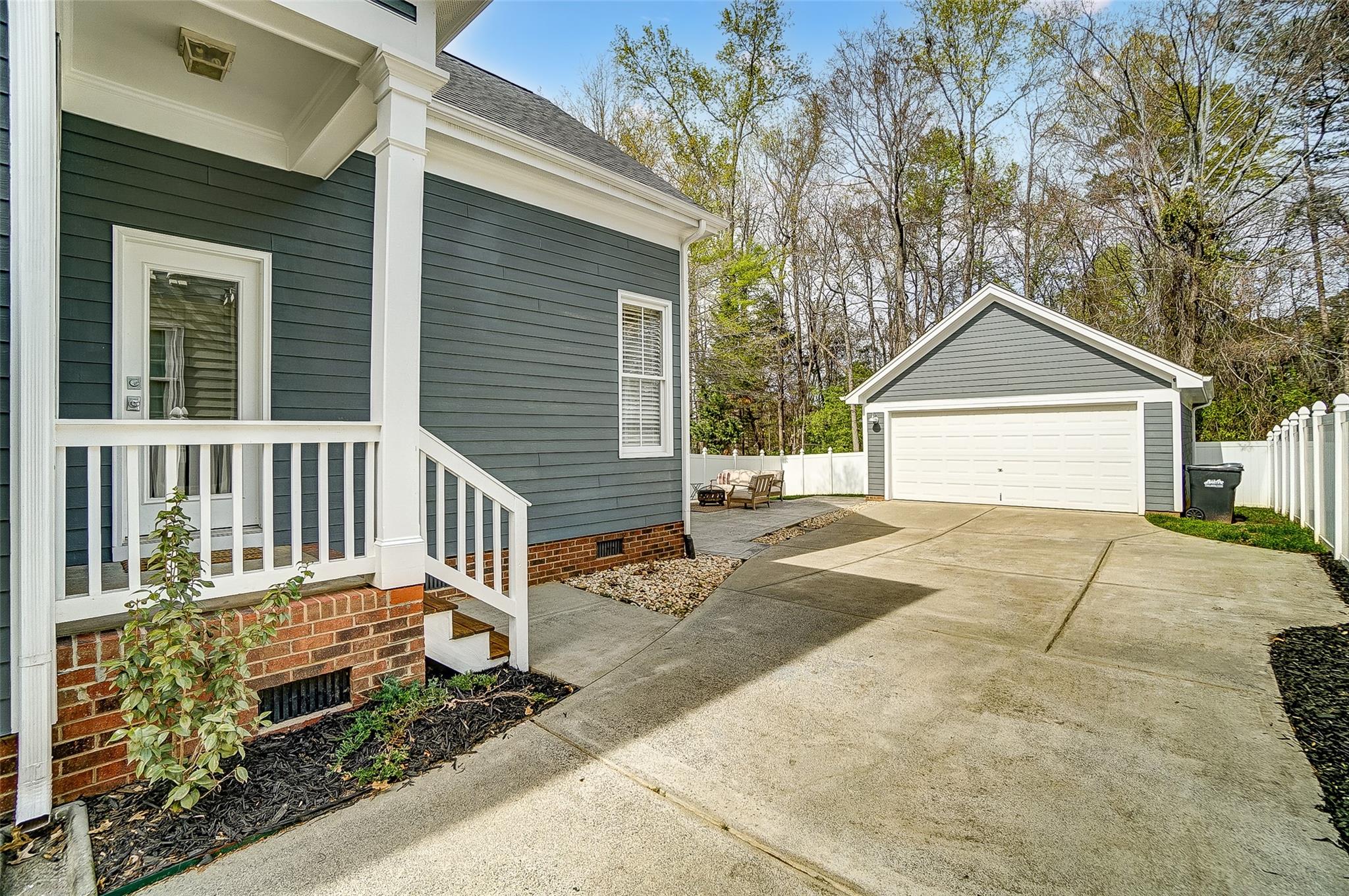 3400 Richard's Crossing Fort Mill, SC 29708 - Photo 39 of 48 a front view of a house with a yard and garage