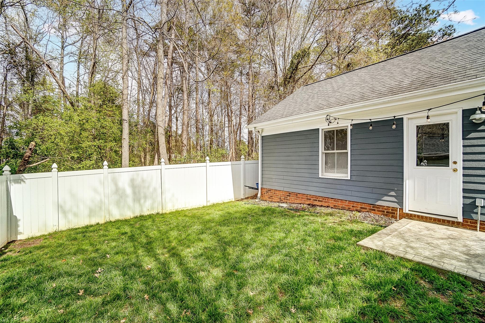 3400 Richard's Crossing Fort Mill, SC 29708 - Photo 44 of 48 a view of backyard with a garden and large tree