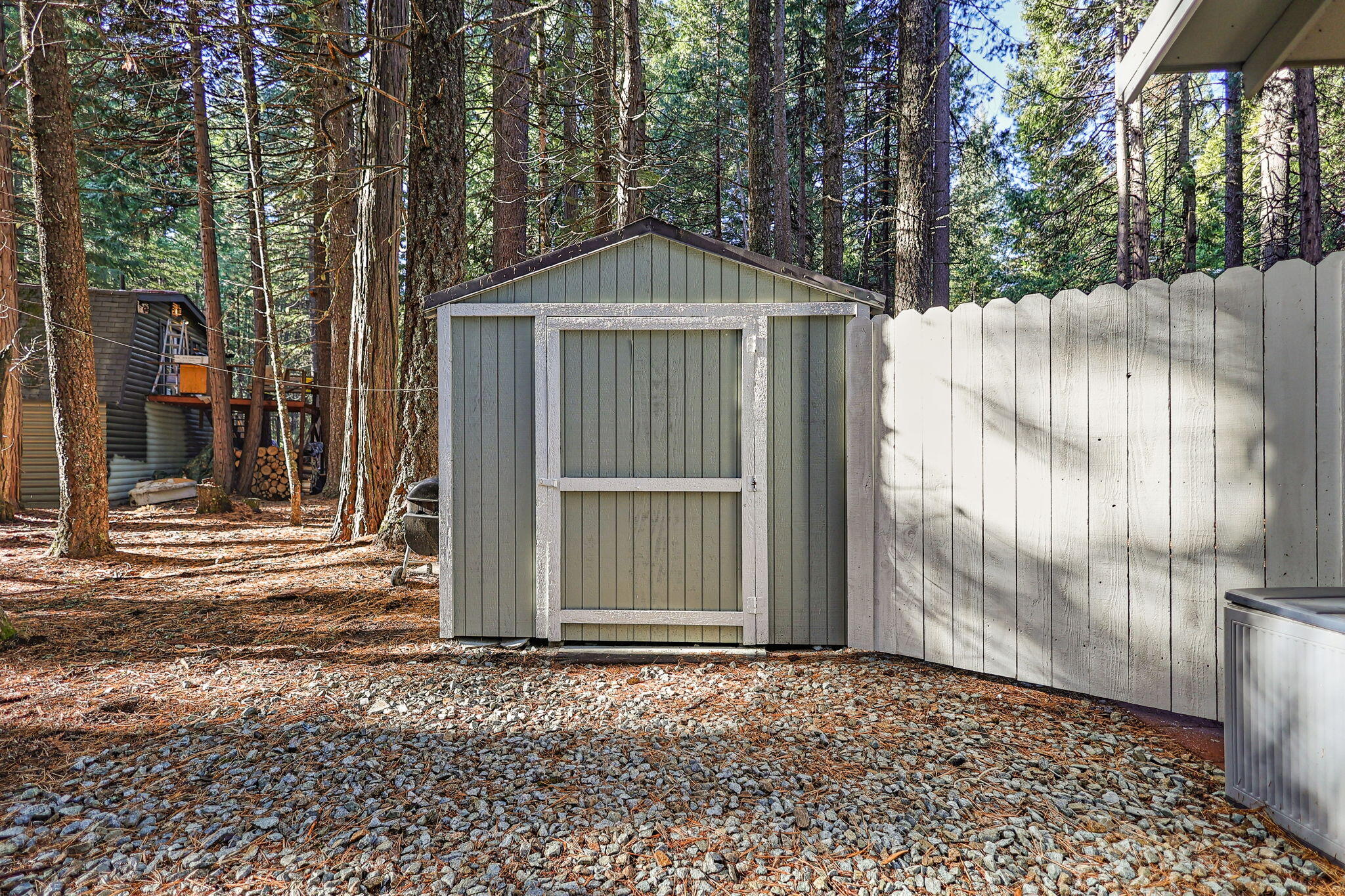 9442 Thatcher Mill Road Shingletown, CA 96088 - Photo 17 of 19 a view of entrance gate and trees
