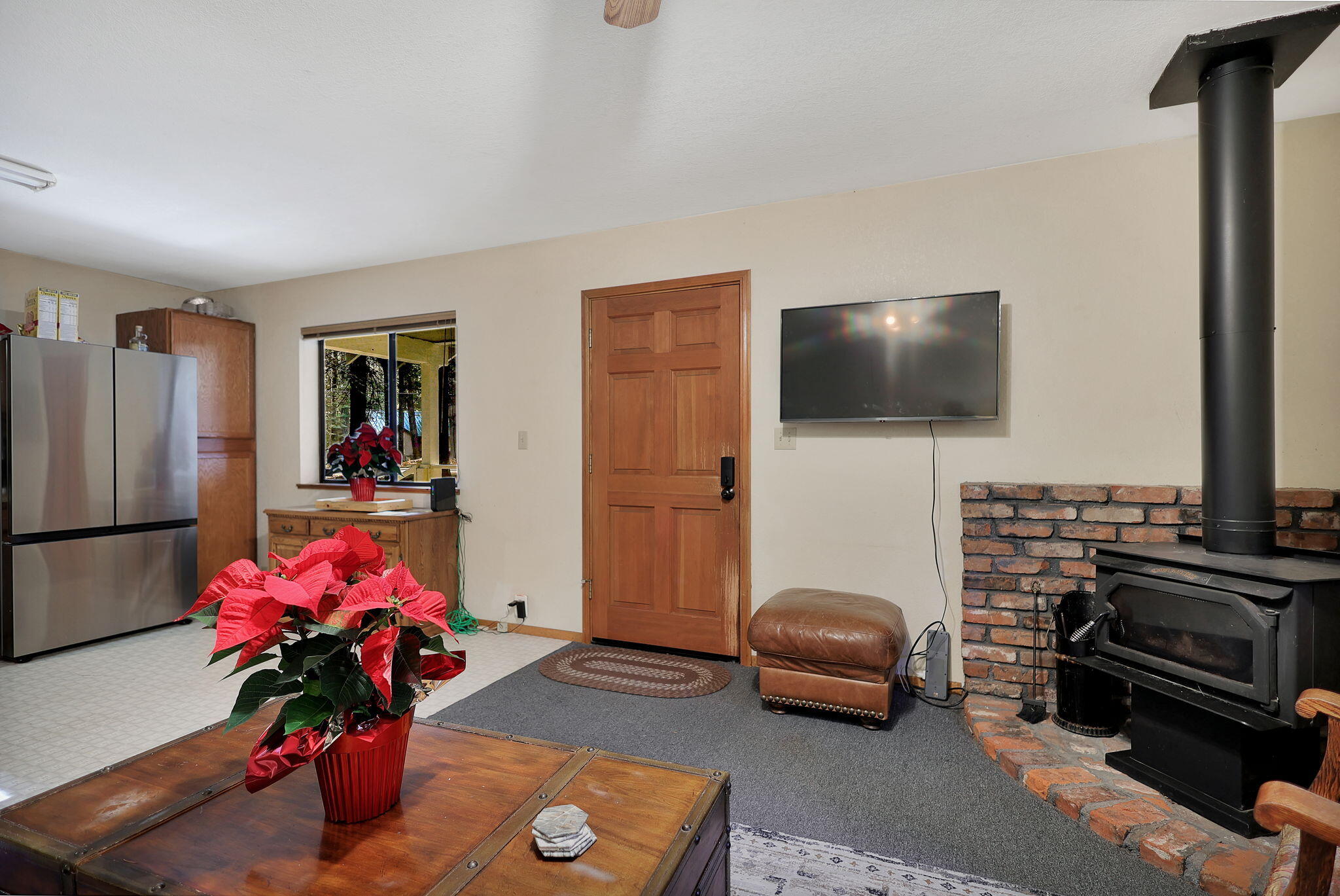 9442 Thatcher Mill Road Shingletown, CA 96088 - Photo 6 of 19 a living room with furniture and a flat screen tv