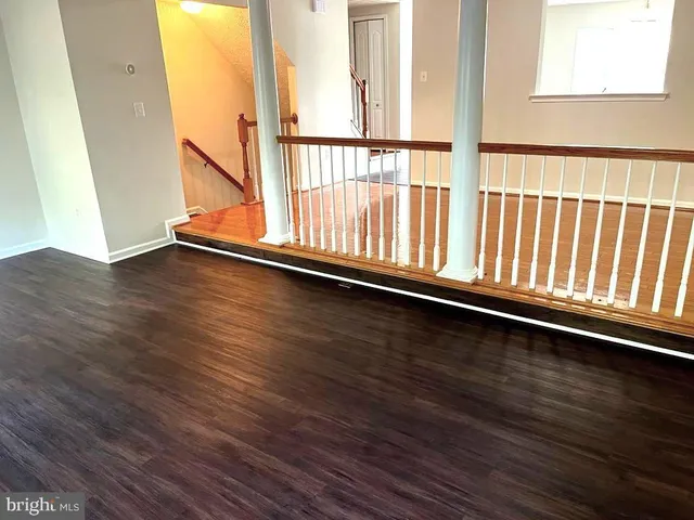 a living room with a fireplace in it and a fireplace