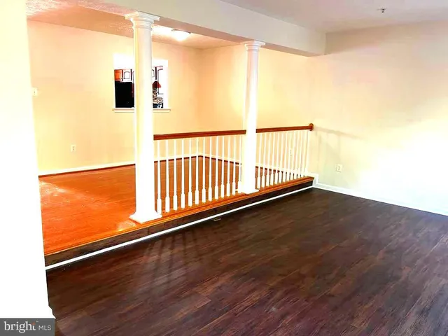 a view of a blue and wooden deck