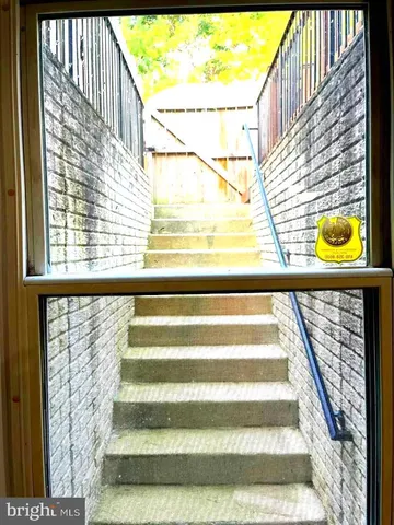 a view of a balcony with a window