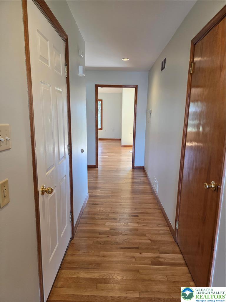 1728 Butztown Road, Unit C1 Bethlehem, PA 18017 - Photo 13 of 33 hall leading to the living room