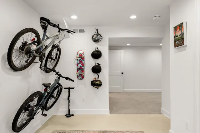 an empty room with a empty space and windows