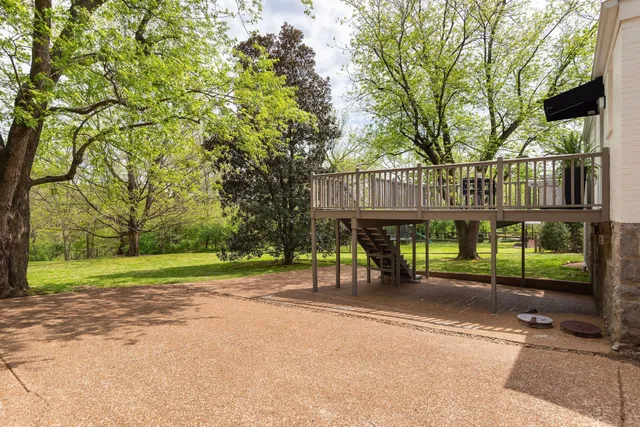 a view of a room with wooden walls