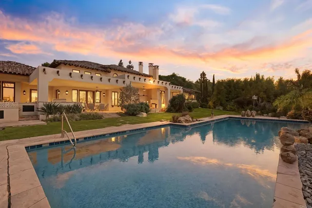 a view of a lake with a house