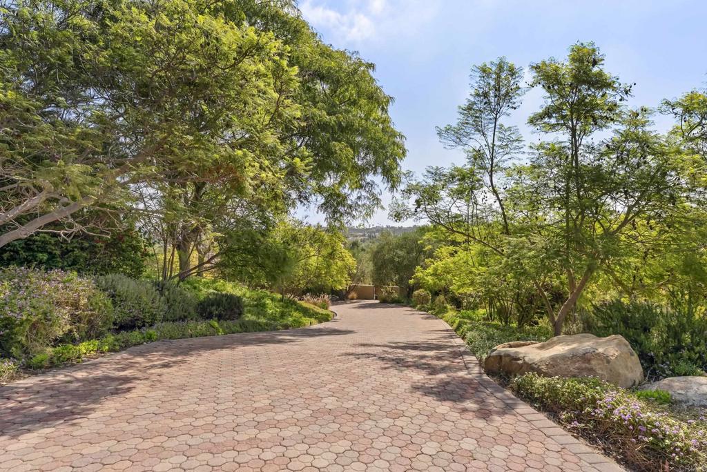 3435 Jasmine Crest Encinitas, CA 92024 - Photo 12 of 41 a wooden bench with view of trees