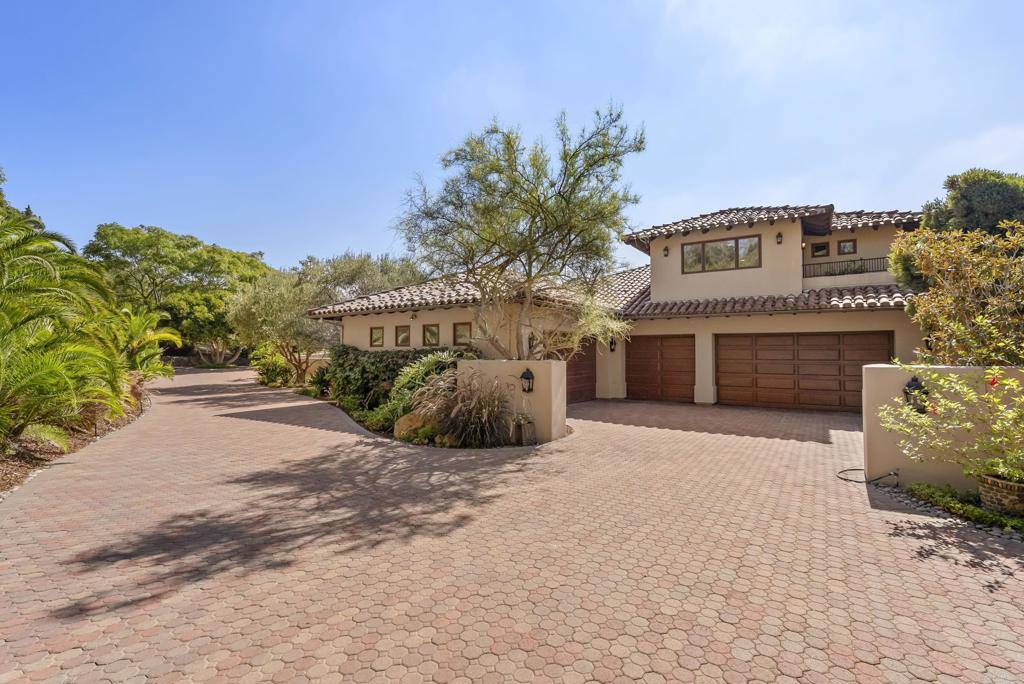 3435 Jasmine Crest Encinitas, CA 92024 - Photo 14 of 41 a large building with a large tree in front