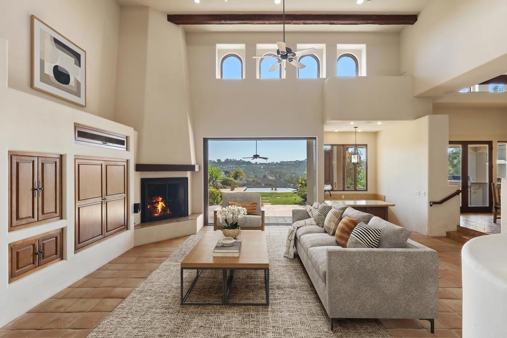 3435 Jasmine Crest Encinitas, CA 92024 - Photo 20 of 41 a living room with furniture and a fireplace