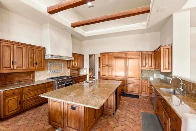 a view of a dining room with furniture large windows and wooden floor
