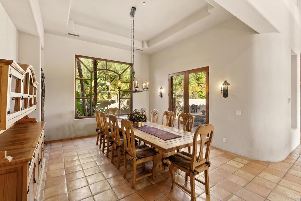 3435 Jasmine Crest Encinitas, CA 92024 - Photo 27 of 41 a view of a dining room with furniture window and outside view