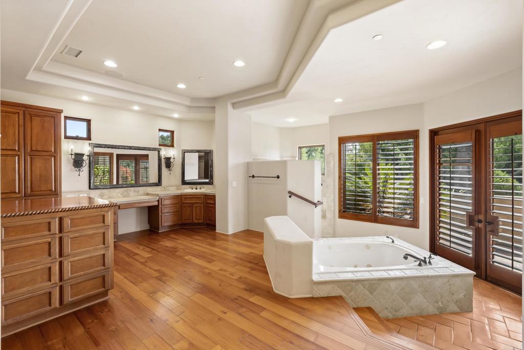 3435 Jasmine Crest Encinitas, CA 92024 - Photo 30 of 41 a living room with furniture and large windows