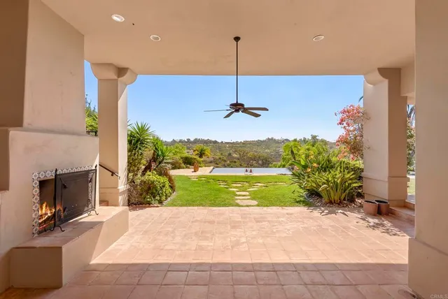 a view of a backyard of the house