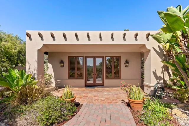 a living room with furniture fireplace and a flat screen tv