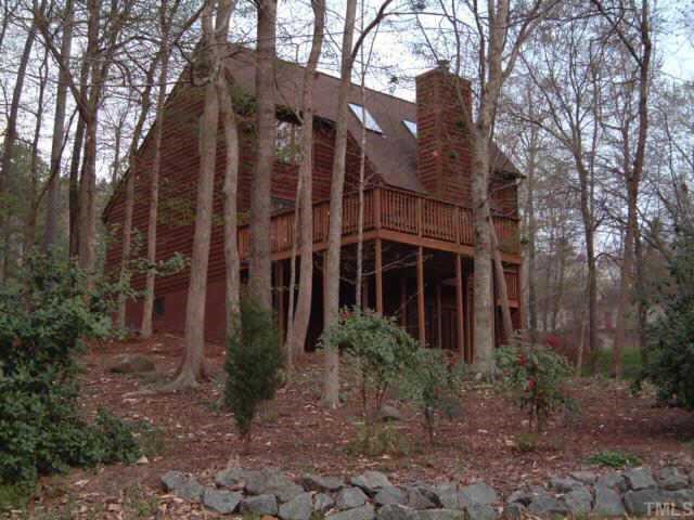 5 Sandstone Ridge Court Durham, NC 27713 - Photo 2 of 6 a view of a house with a yard and large trees