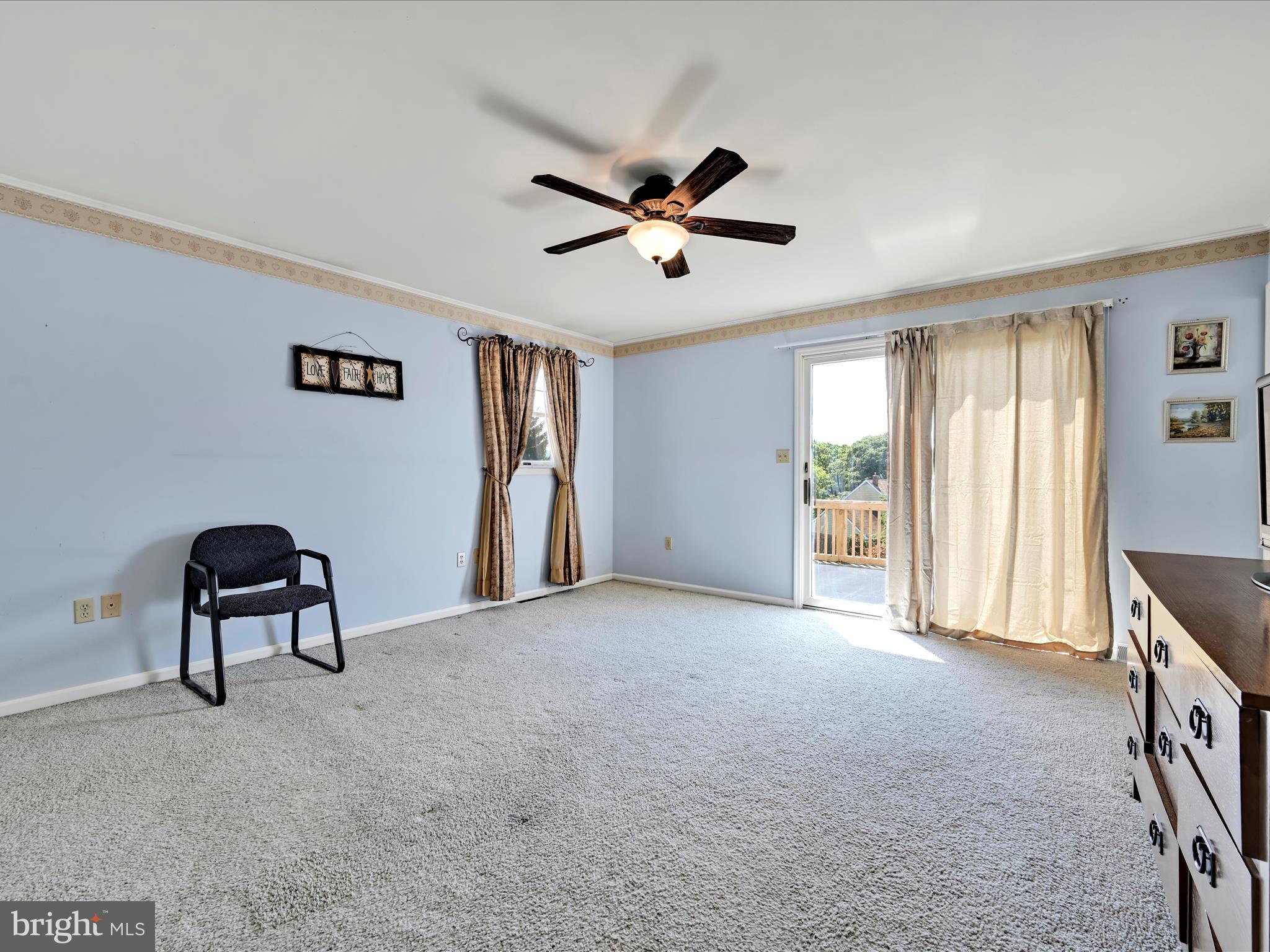 600 Beech Street Reading, PA 19605 - Photo 24 of 50 a view of a livingroom with a ceiling fan and window