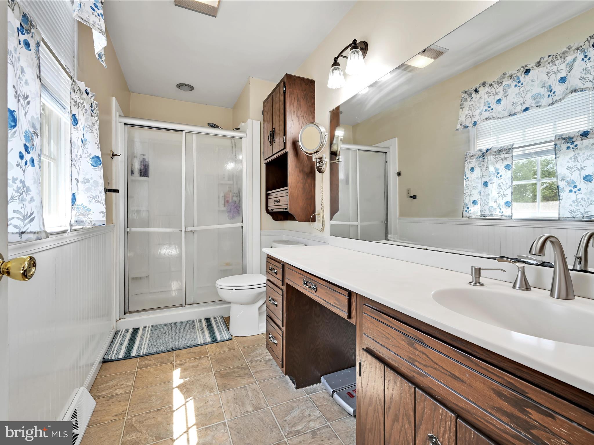 600 Beech Street Reading, PA 19605 - Photo 26 of 50 a bathroom with a sink a toilet and shower