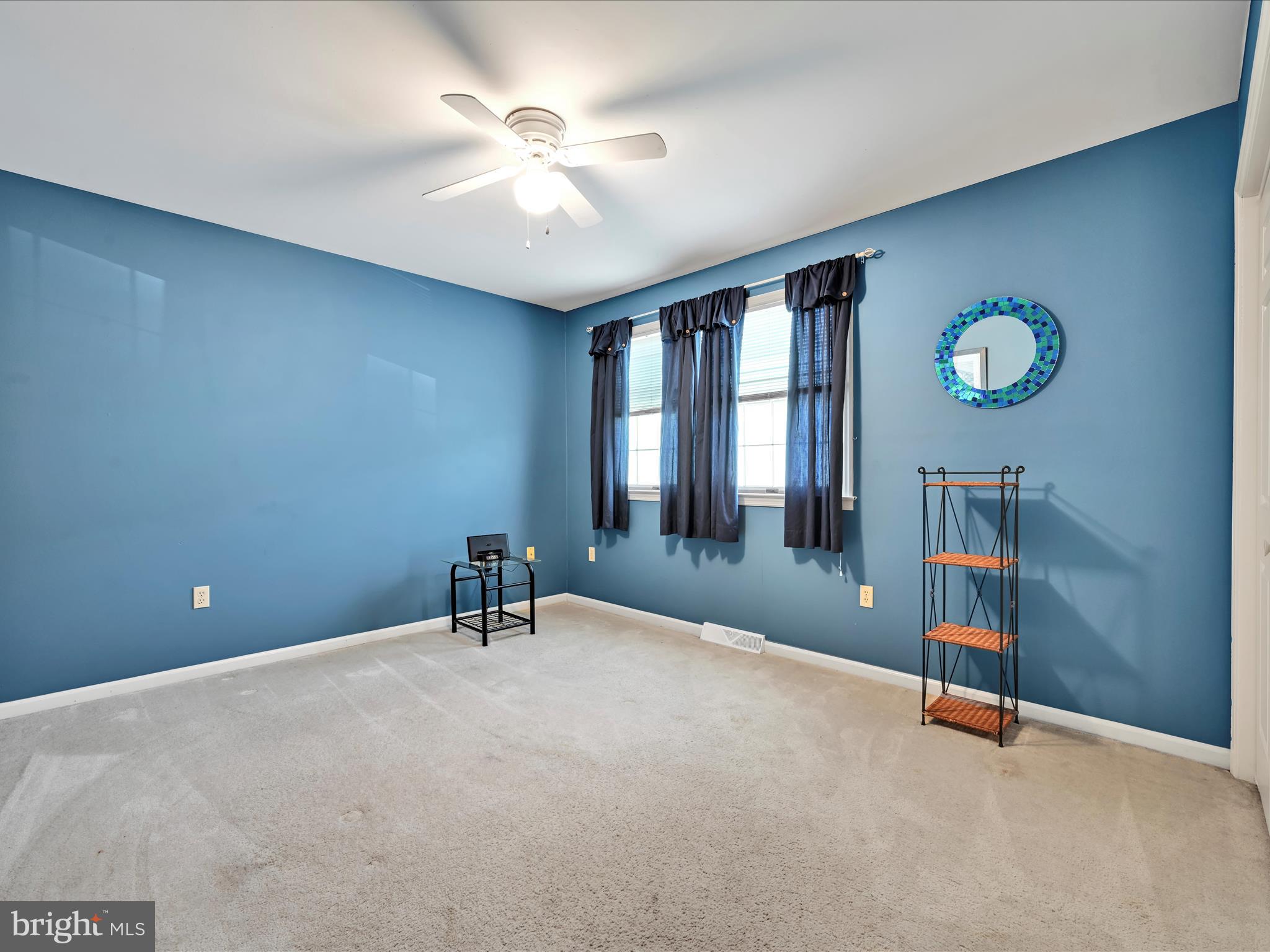 600 Beech Street Reading, PA 19605 - Photo 31 of 50 a room with gym equipment and a large window
