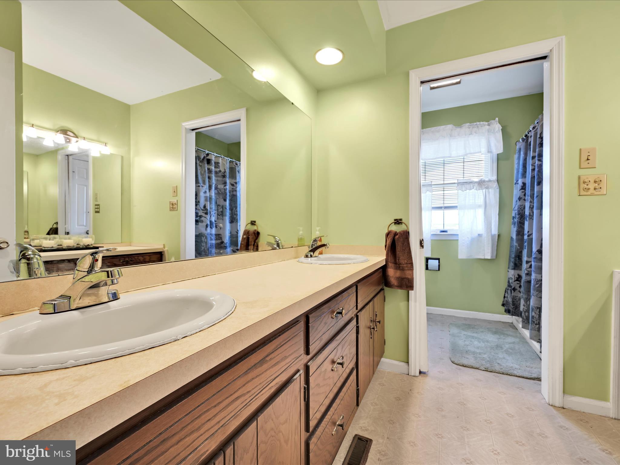 600 Beech Street Reading, PA 19605 - Photo 35 of 50 a bathroom with a sink and a mirror