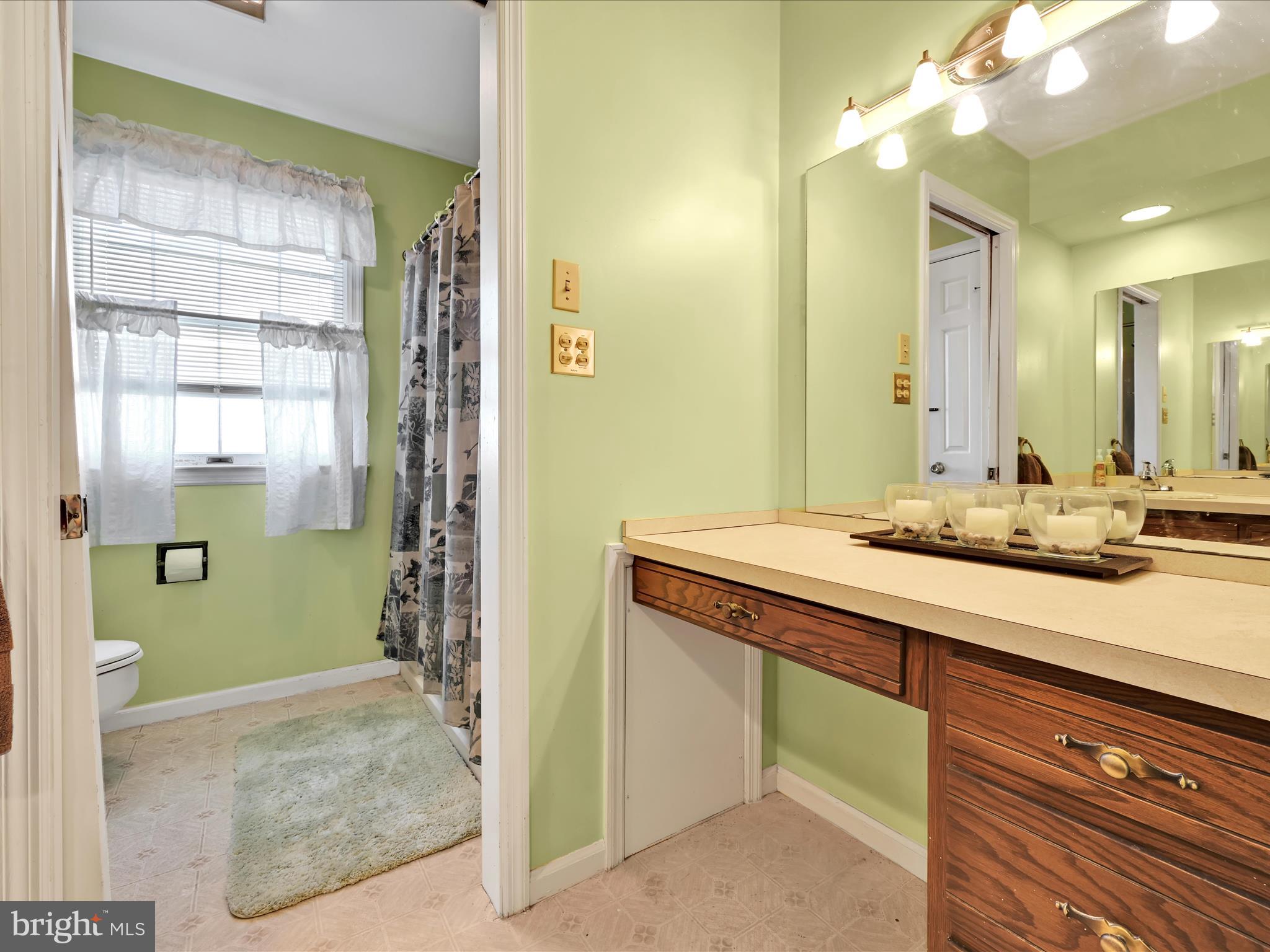 600 Beech Street Reading, PA 19605 - Photo 36 of 50 a bathroom with a sink and a mirror