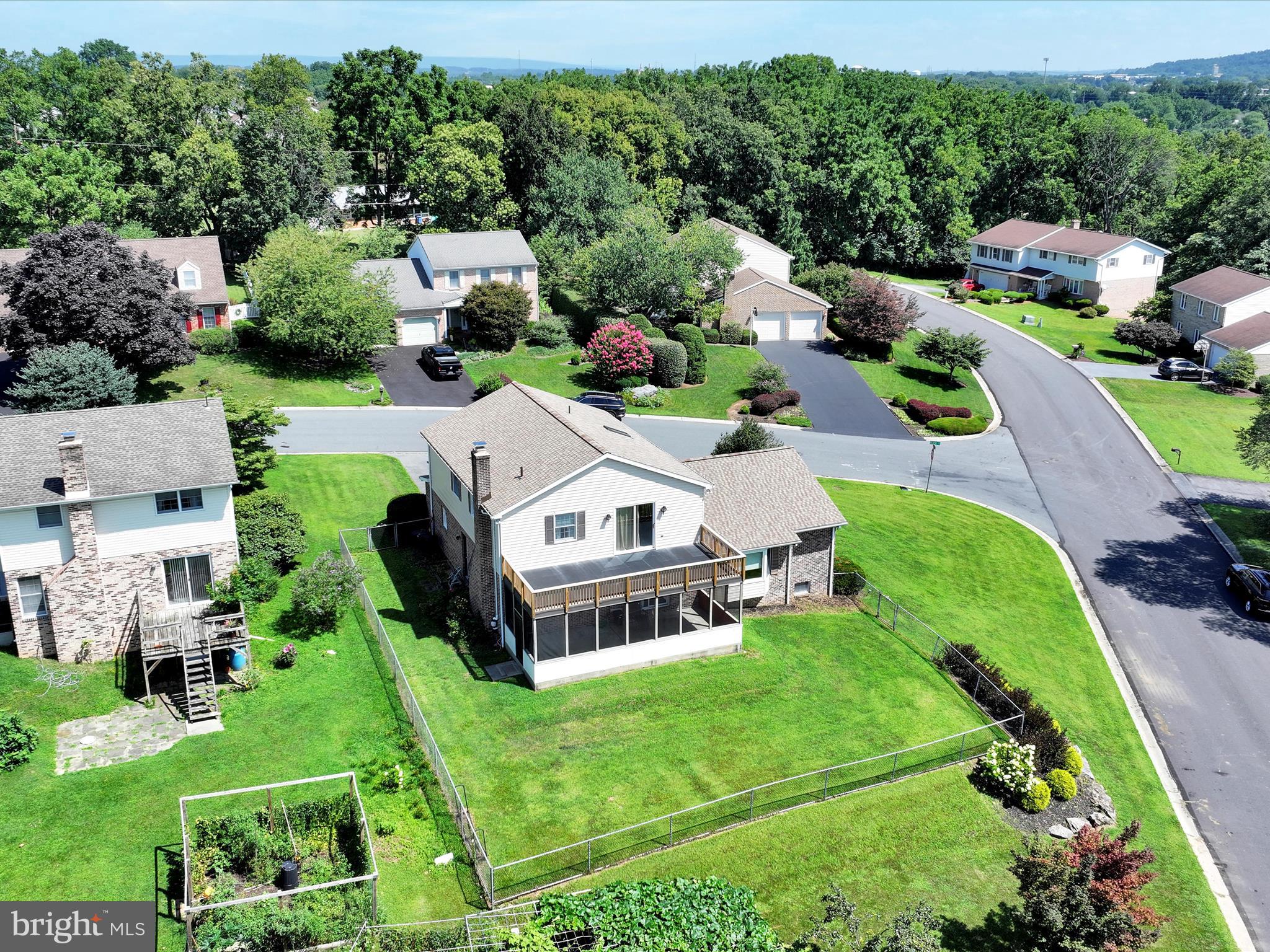 600 Beech Street Reading, PA 19605 - Photo 45 of 50 an aerial view of multiple houses with a yard