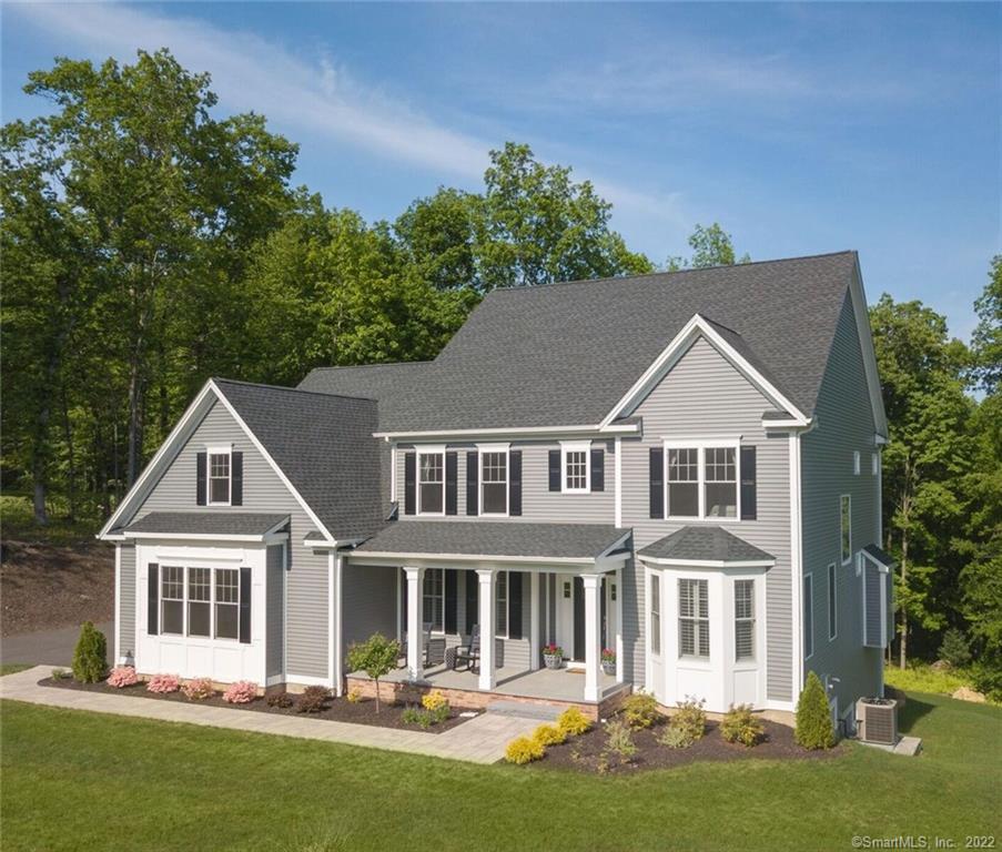48 West Ledge Road Burlington, CT 06013 - Photo 1 of 1 a front view of a house with a yard